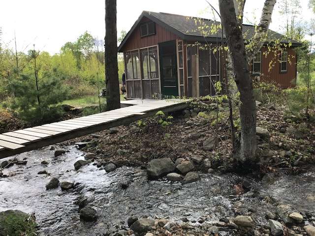 This site is not suitable for children as there is a stony bank and bridge over stream without rails