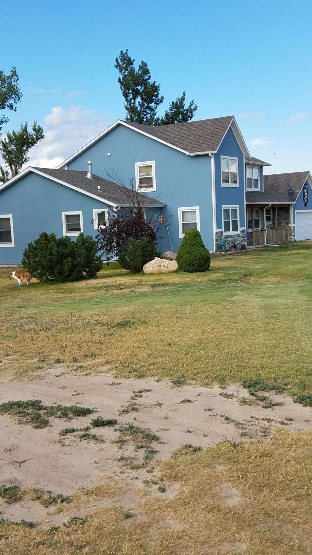 OUR HOME AS YOU DRIVE UP TO OUR PROPERTY