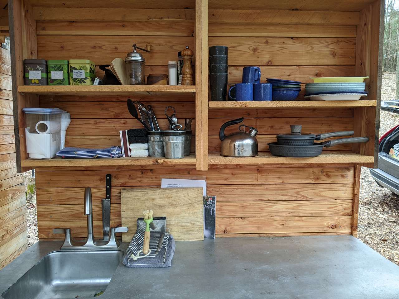 Our camp kitchen is equipped with basic dishes and cookware. 