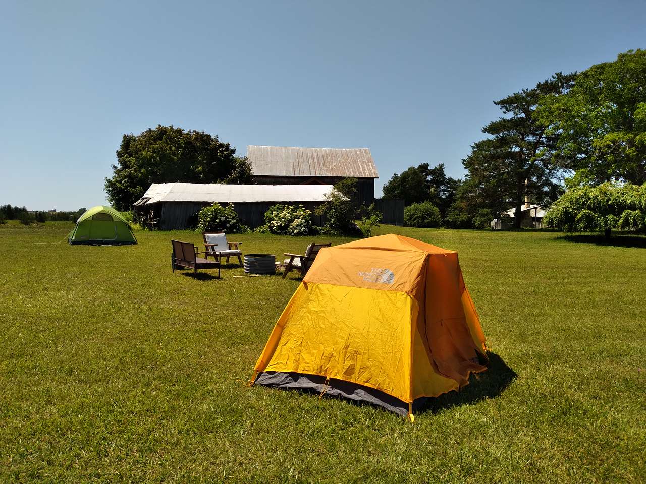 Lots of room for multiple tents and includes a fire ring and fire wood. Easy access to the Events Barn.