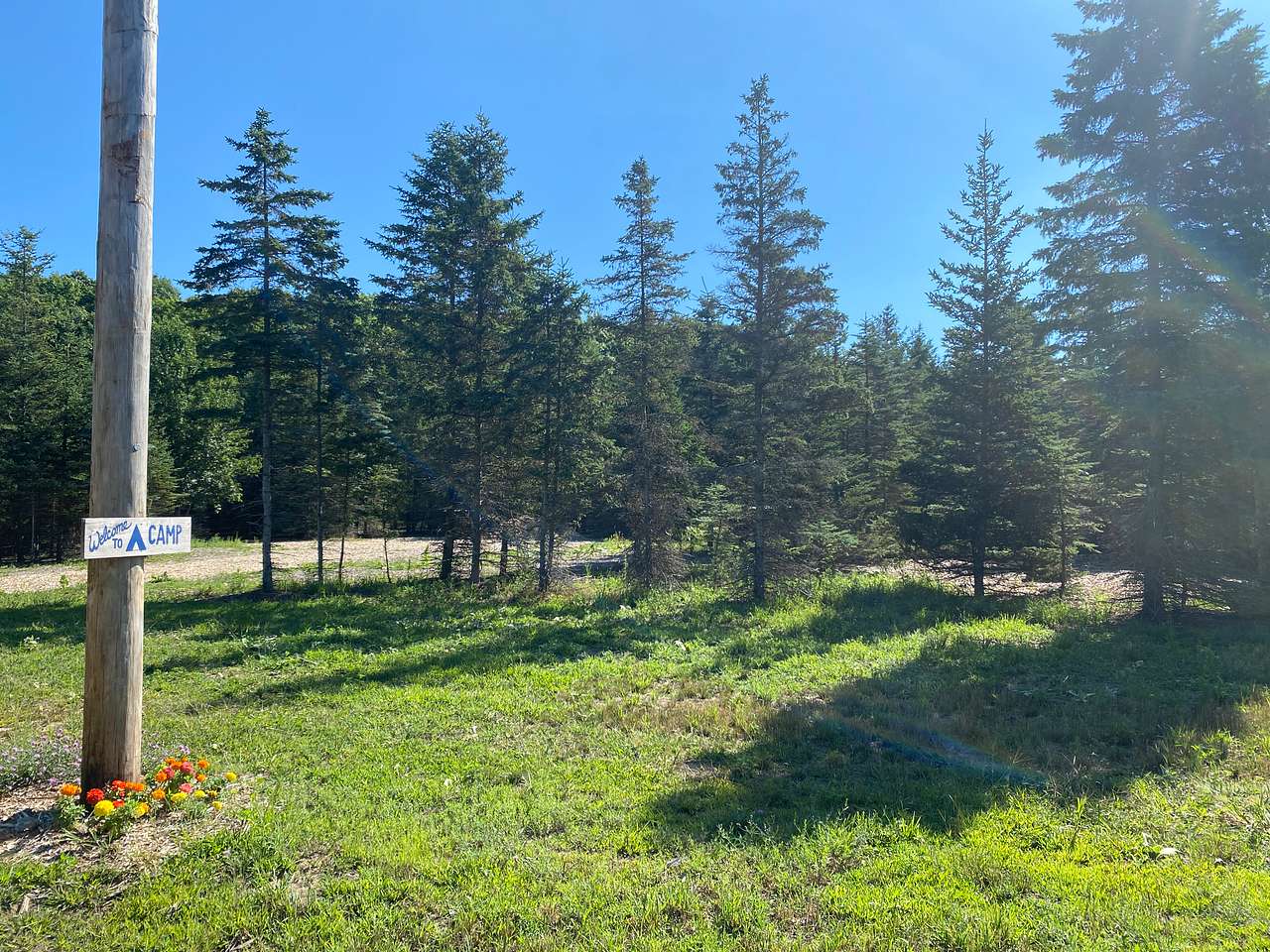 view of camp entry and site #4 from the farm road