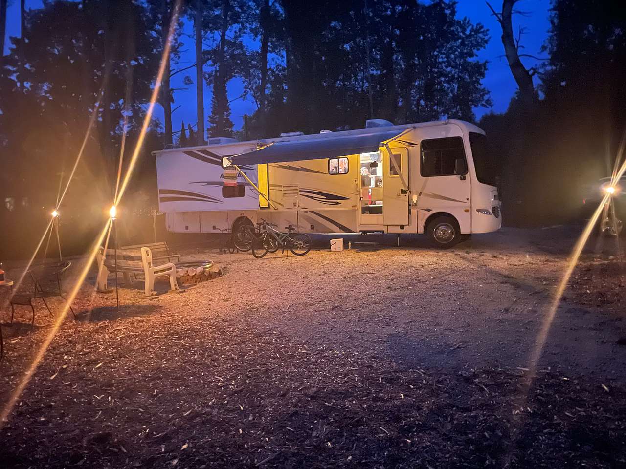 We (39') are parallel to the road facing the electrical connections, grill, and campfire. 
