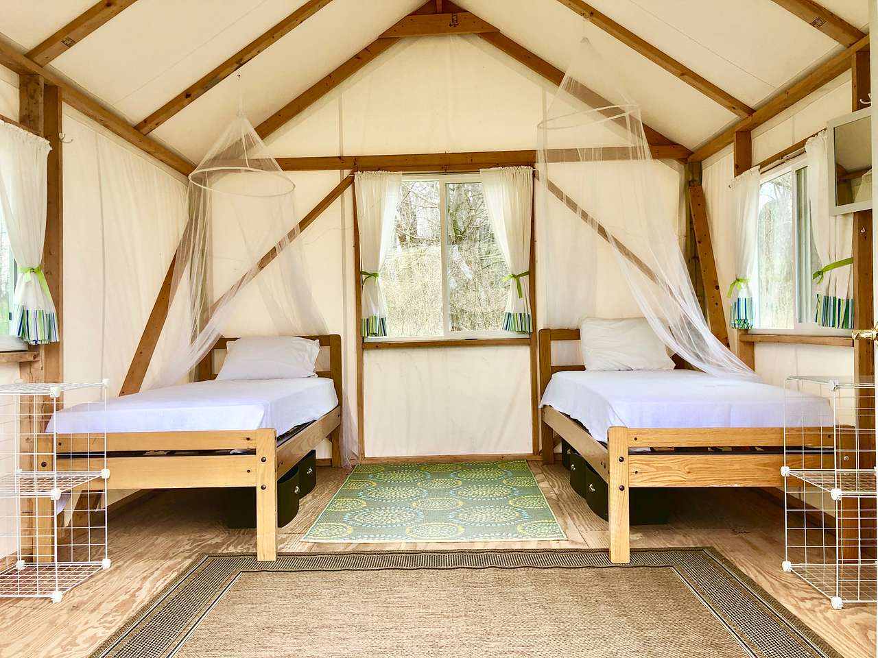 Inside the lower bungalow. Additional thick camping mat available under beds. 