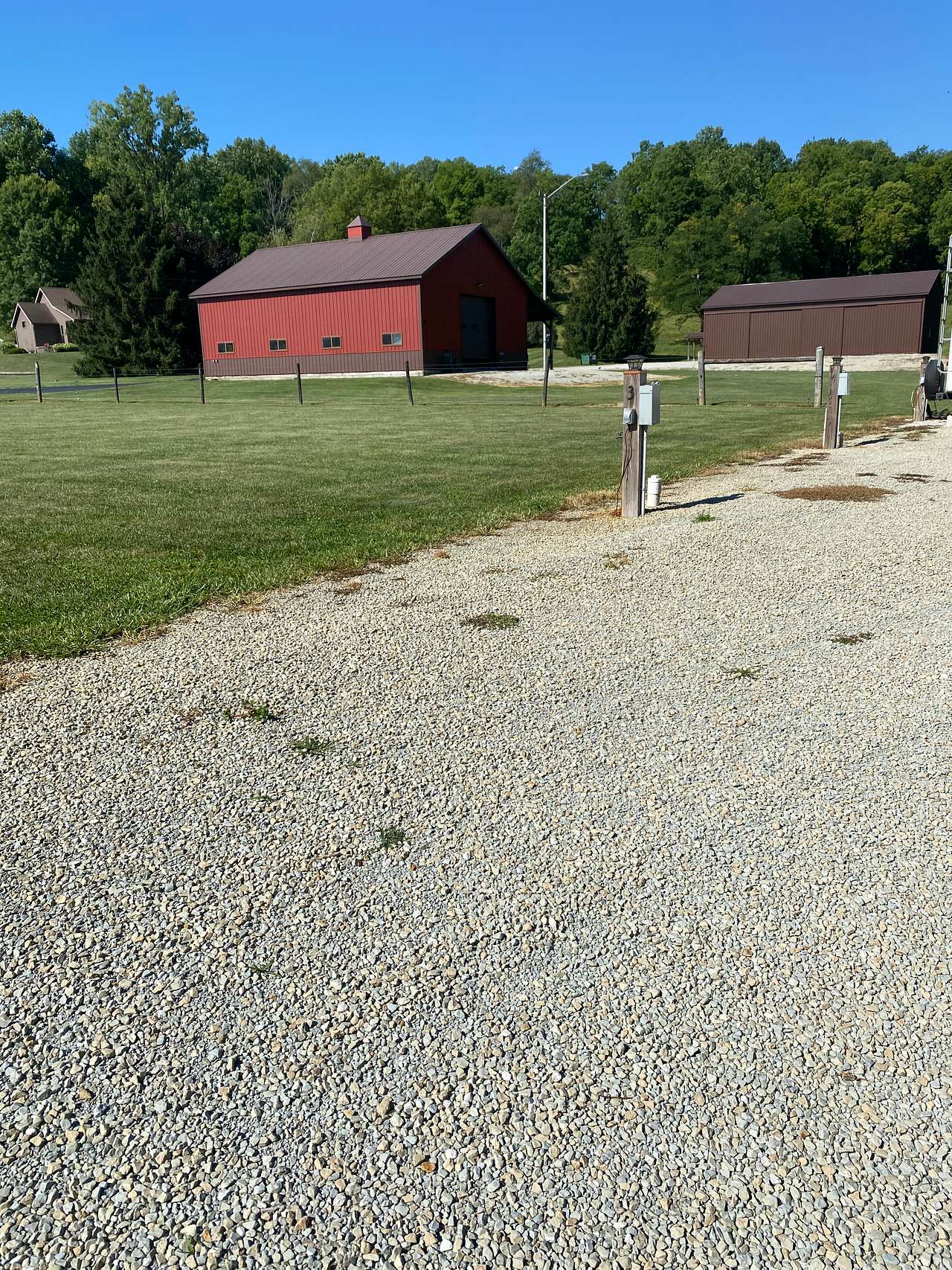 Site #3.  Grass will be behind your camper.