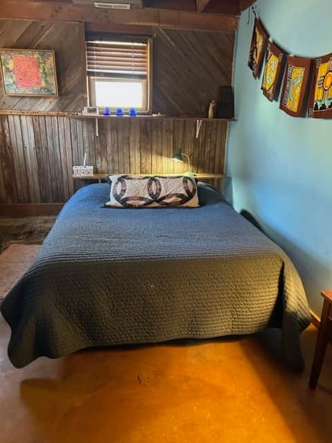 Queen-sized waterbed with tubes of water (not one sloshy bladder) Comfortable 