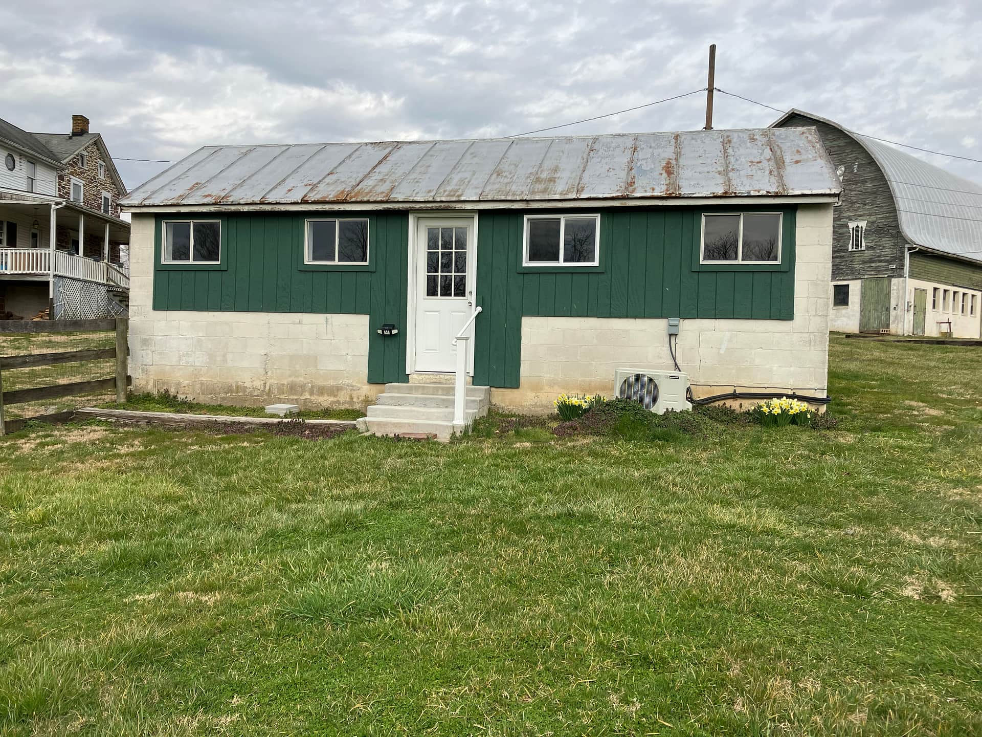 Renovated outbuilding for those who do not have camping equipment.  Heated and airconditioned for any season! Fire pit available for cookouts.