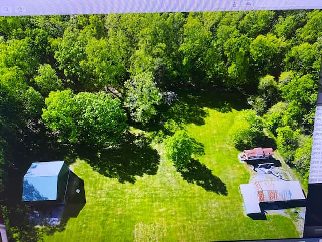 Site 3, upper left corner, wooded area, tent, small RV, trailer