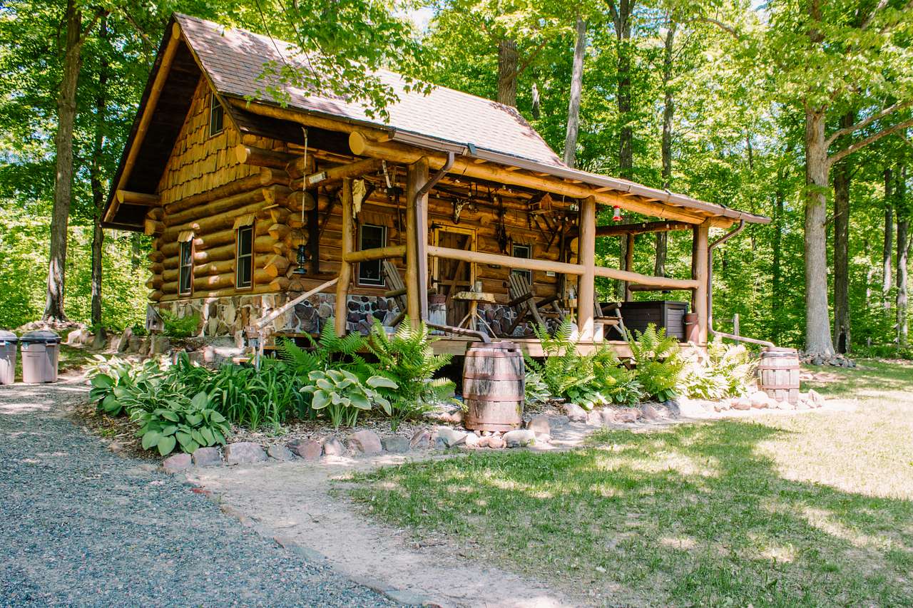 The Cozy Cabin - watch for hummingbirds at the feeder on the porch