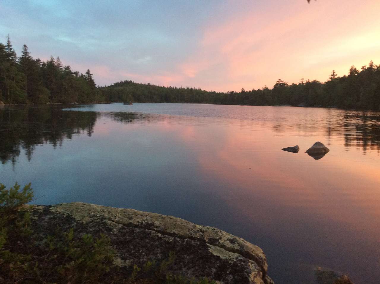 View from the lake shore at sun set.