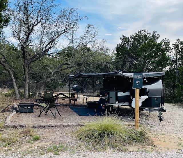 Great site for both RVs and Tents.  50/30 amp hookup with water and 110v outlets. Mulched area with picnic table, fire ring and grill