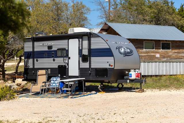 RV site with full 30 amp hookup, water and septic.  Next to fully stocked community kitchen.