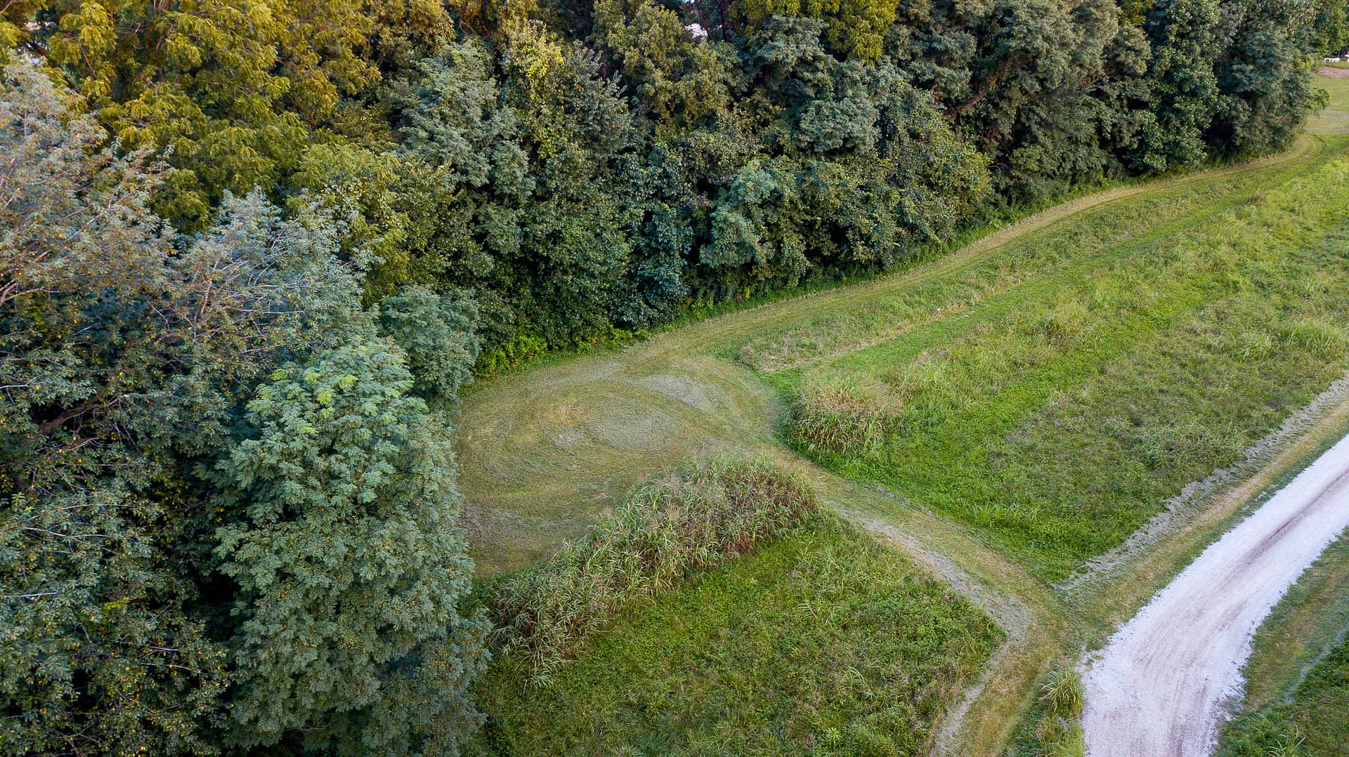 Aerial view of campsite number one with mowed grass entrance.