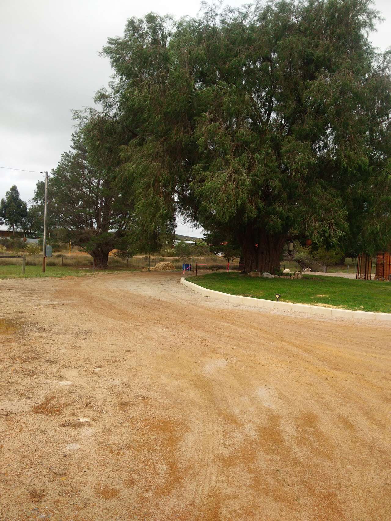 This is the access to the paddock, as you can see plenty of space for a van or motor home to pass.