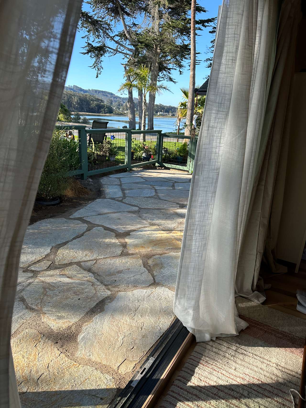 Private patio and view from french doors over looking the bay