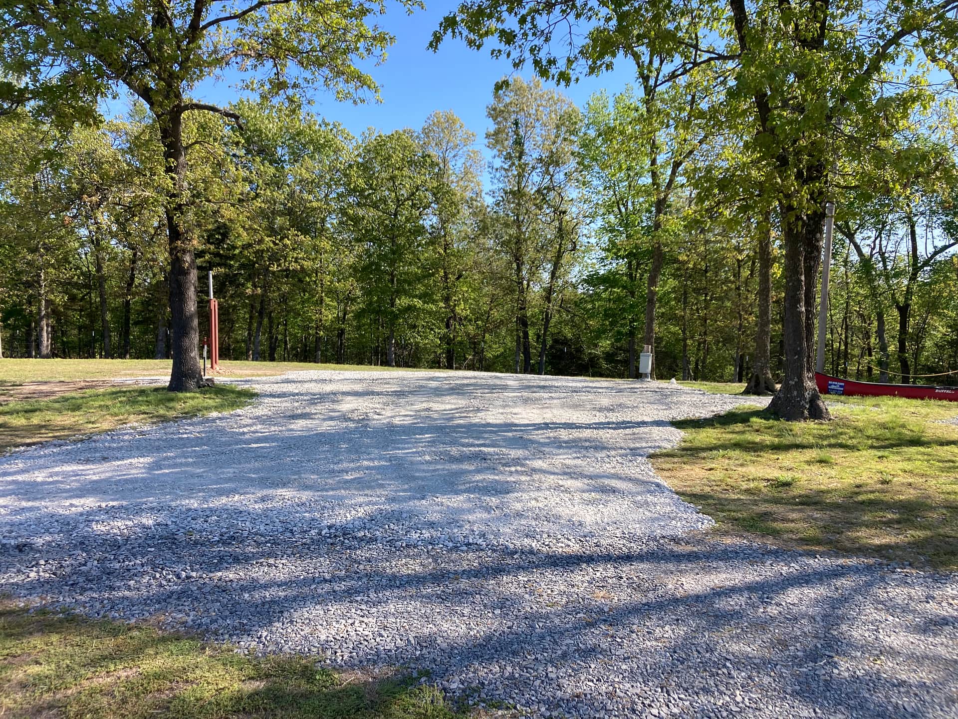 Rv Site 1 has gravel. You will still need to level your RV. This site is the one furthest from The Jesus Bus