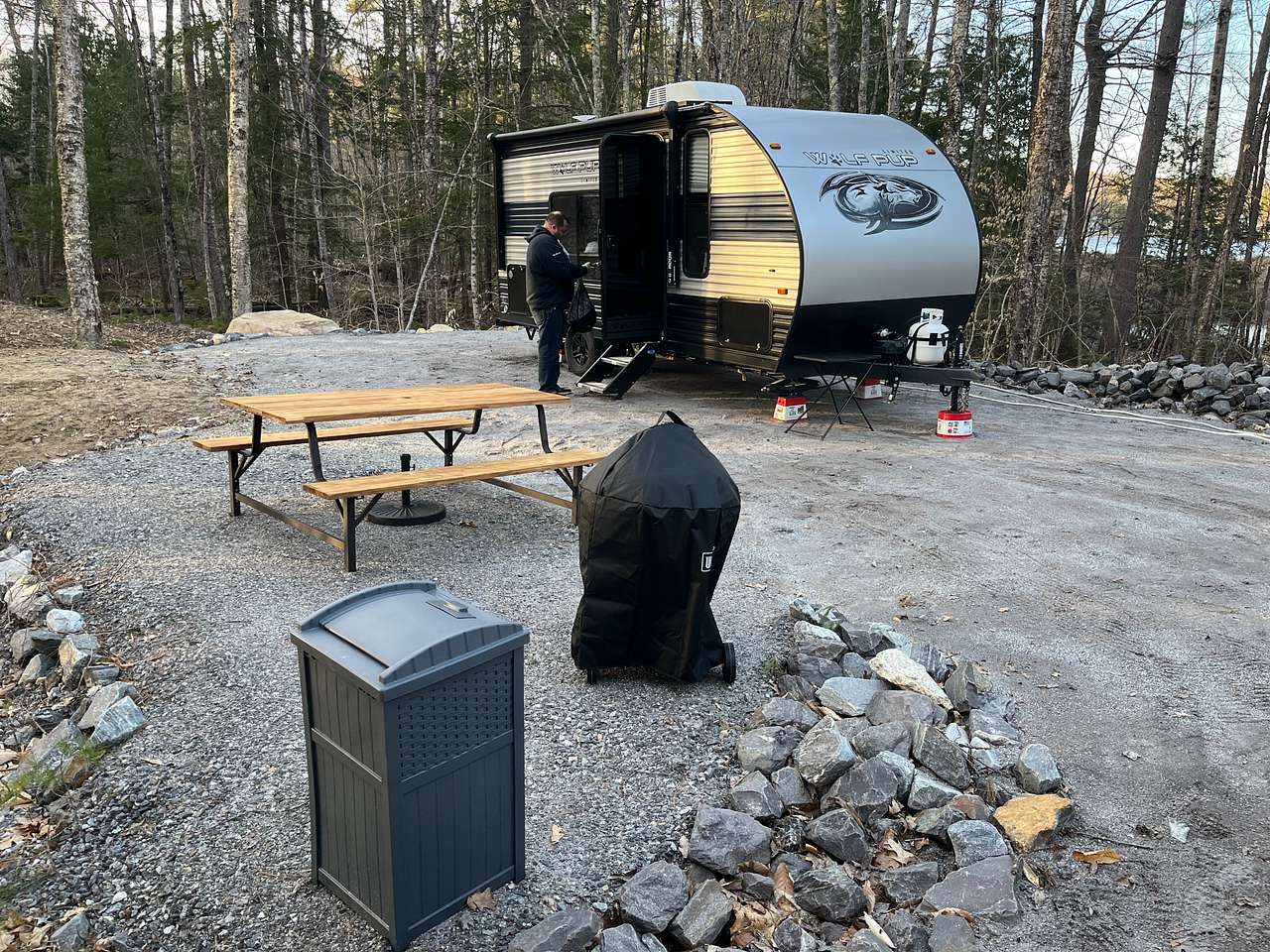 The picnic table and grill