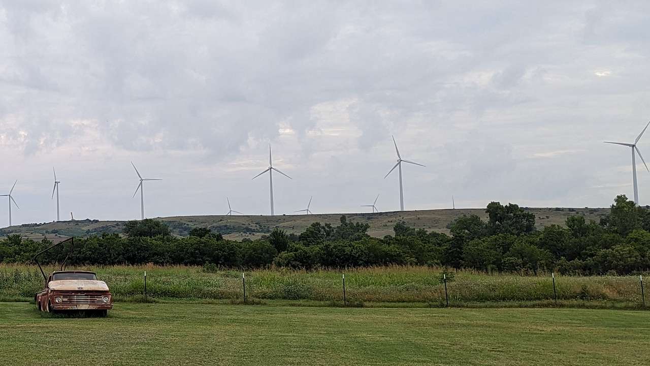 Wind turbines as seen from the back of the lot.