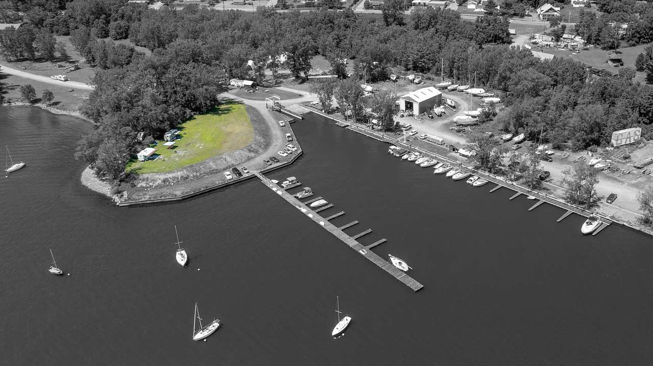 The Plateau site, shown in color, is located on a raised area, roughly 10 feet above the docks and marina.