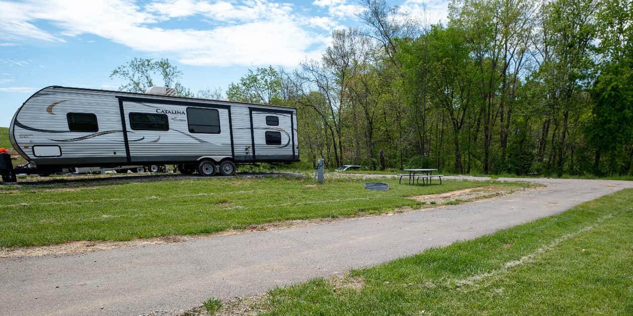 Back in water & electric (NO SEWER) - firepit & picnic table included.