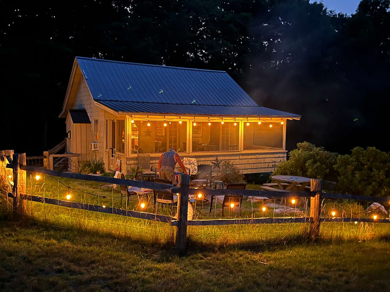 Visit our Remote cabin with all the comforts of home. Cook dinner on the fire pit and then relax and enjoy the warm glow of the lights and look at the stars.