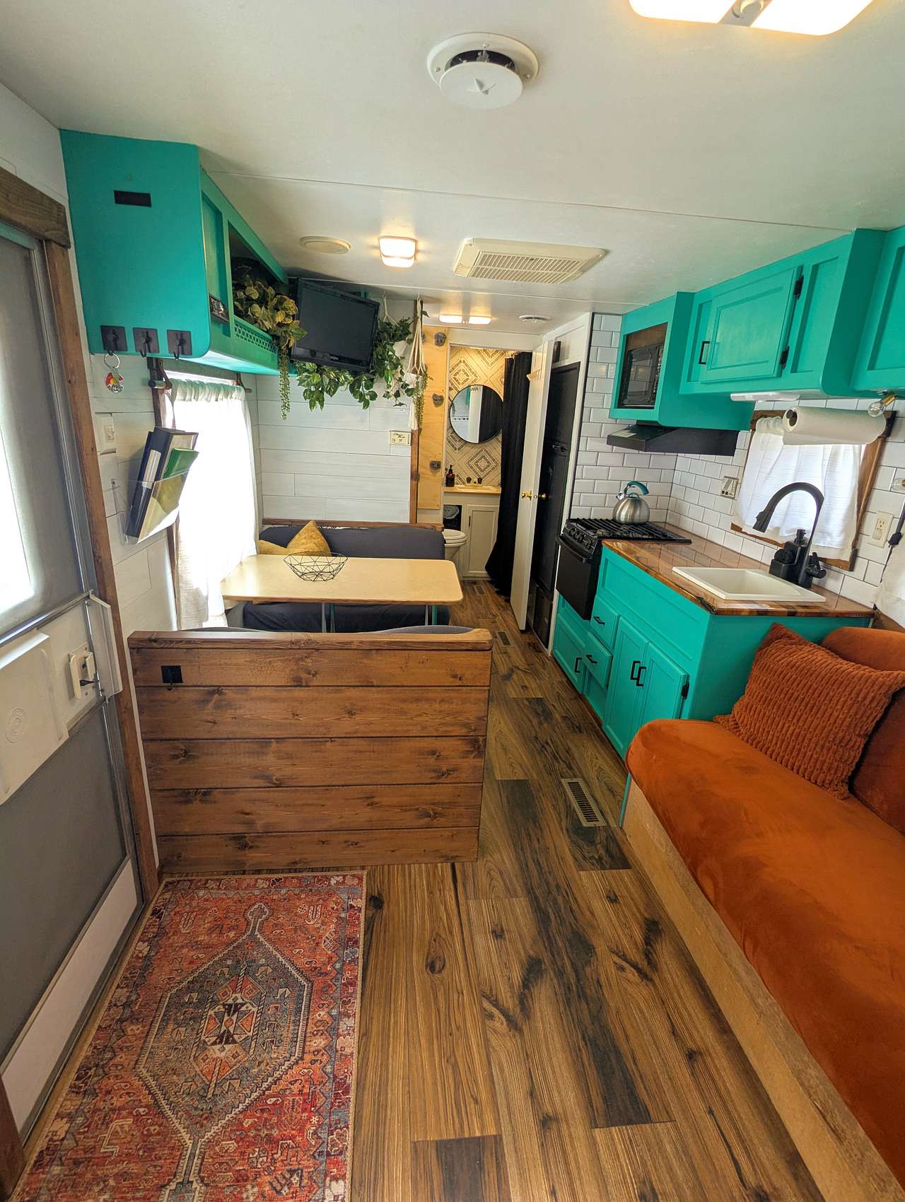 Welcome to the Boho Glamper! Upscale your camping experience in our fun and cozy RV camper in Black Forest CO. You can enjoy many amenities, four bed spaces, one private bedroom, shower and small bath, grill, picnic table, patio table and  propane fire pit. Visit your goat neighbors and go for a walk on the private property or go explore the many facets of Colorado Springs!