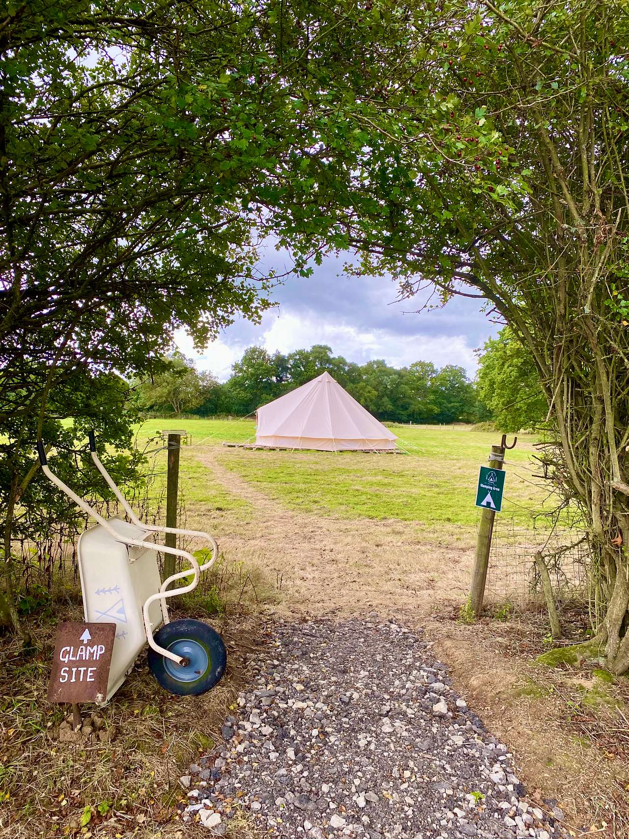 Big Top in the glamping field. Use the wheel barrow to ferry your things to the tent