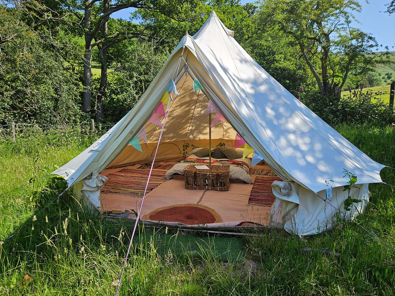 We have four bell tents - 2x 5M Bells (Butterfly and Ladybird) and 2x 4M Bells (Cuckoo and Buzzard with stove). All are accessed on foot (so please consider this when packing for your hols!) Wheelbarrows are provided to move kit and distance from carpark ranges between 100m to 250m up a gentle slope.