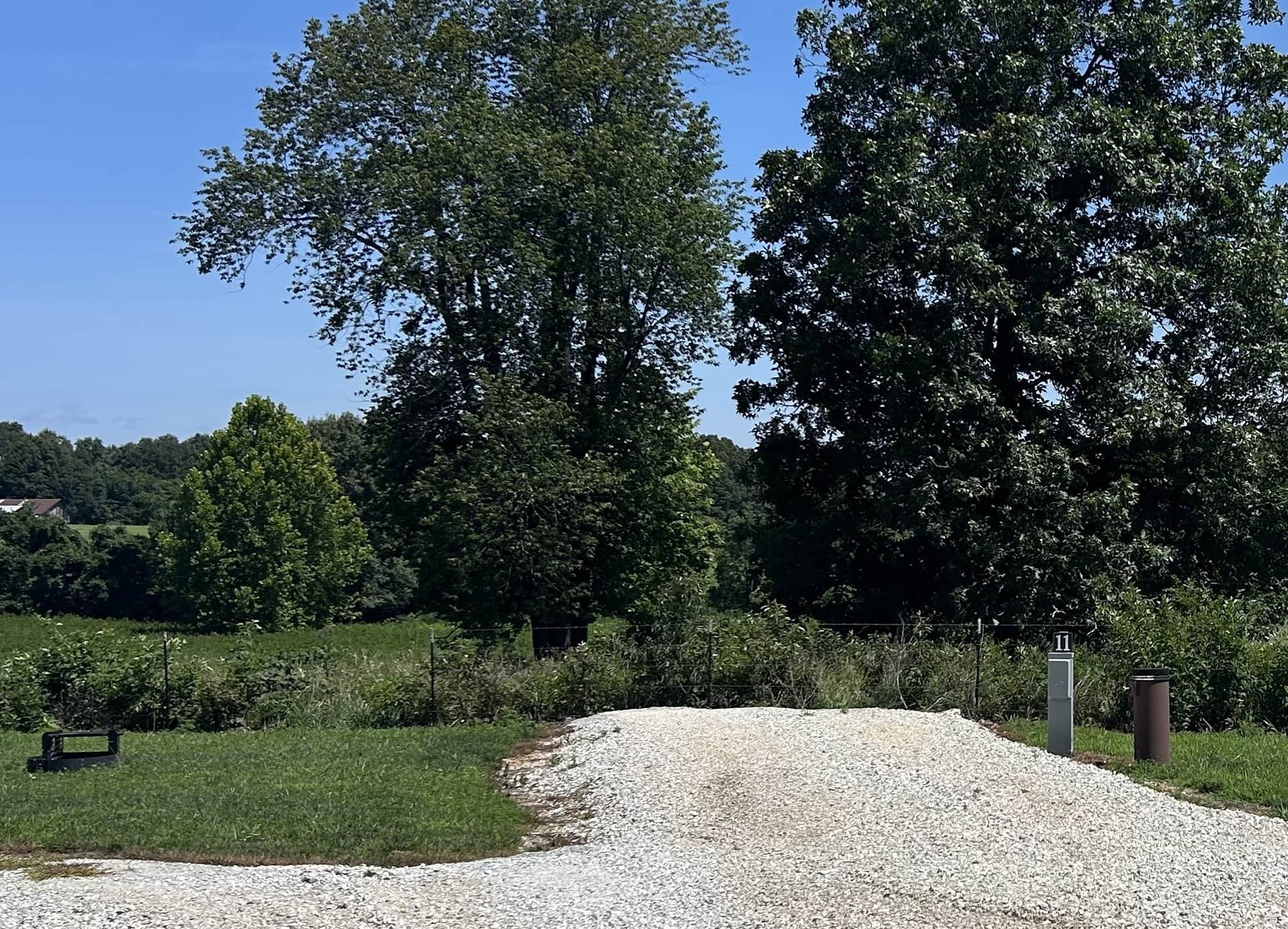 Site #11 is a back-in site, approximately 40 feet in length, with water/electric only. 50/30/20 amp service is available - take your pick. We are the only campground in the area that provides potable water.