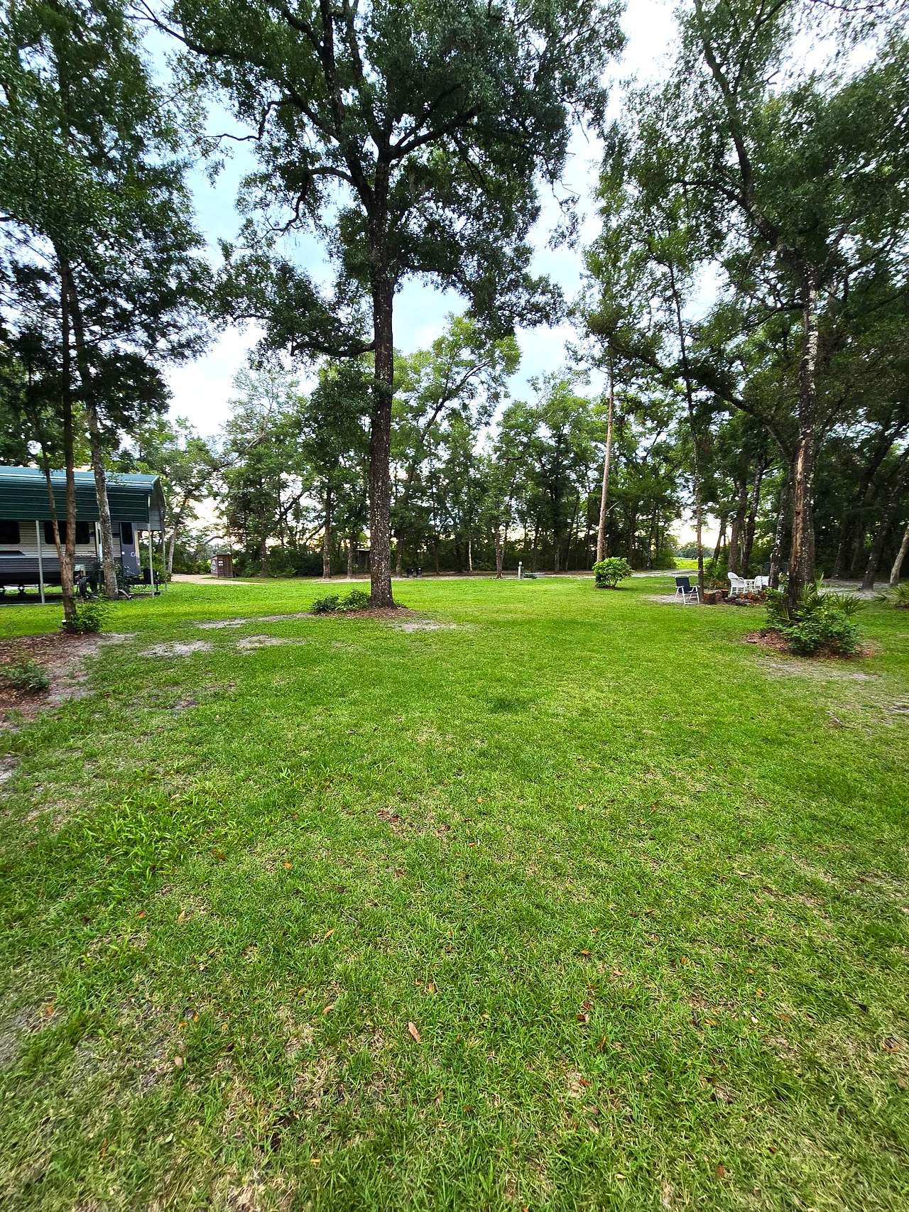 The Hatch Bend Hideaway offers only one full hook-up site.
The property owner, Capt. Cas, has a covered destination trailer permanently on property and does occupy during the evening.   