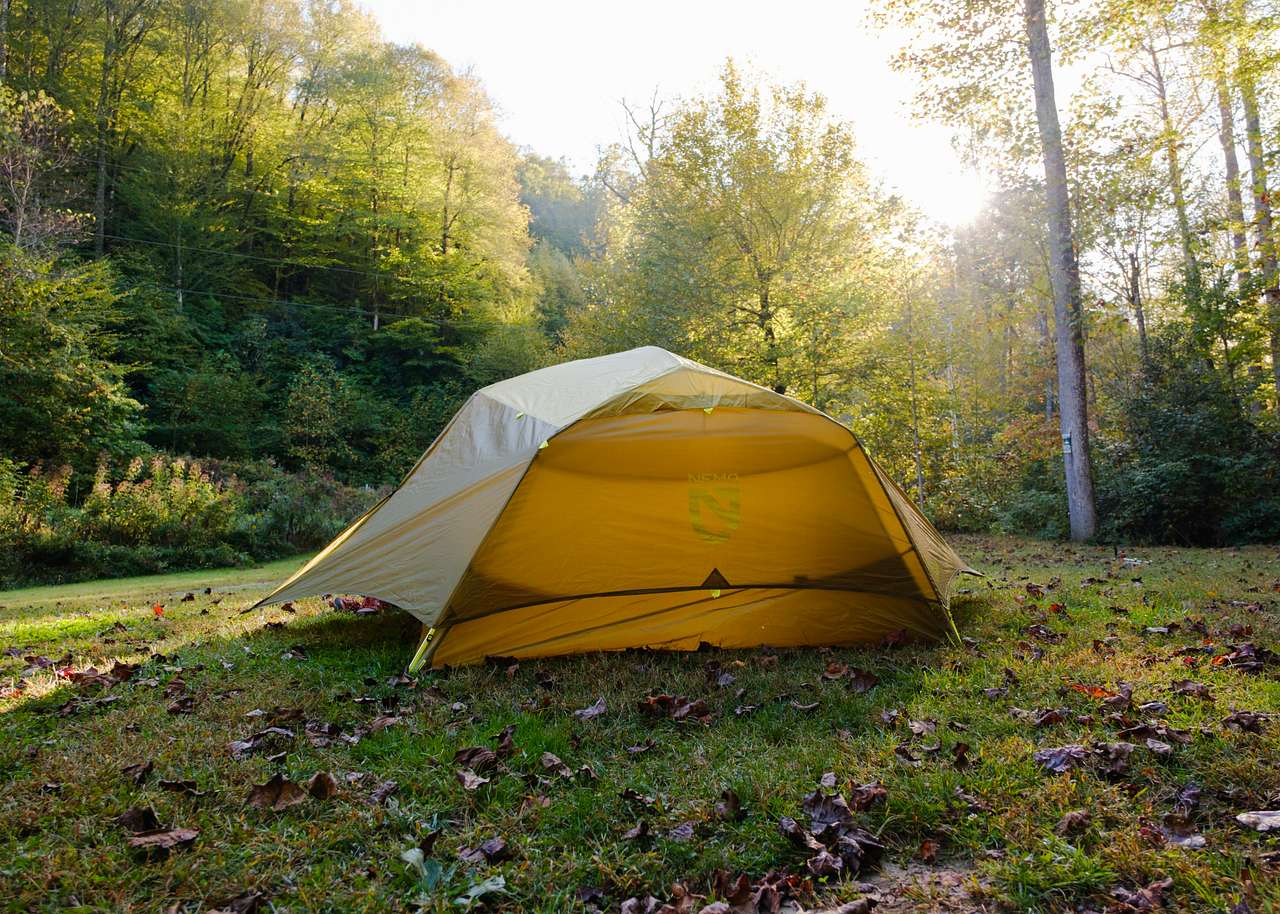 Site 1 - Golden hour lighting up the campground and tent