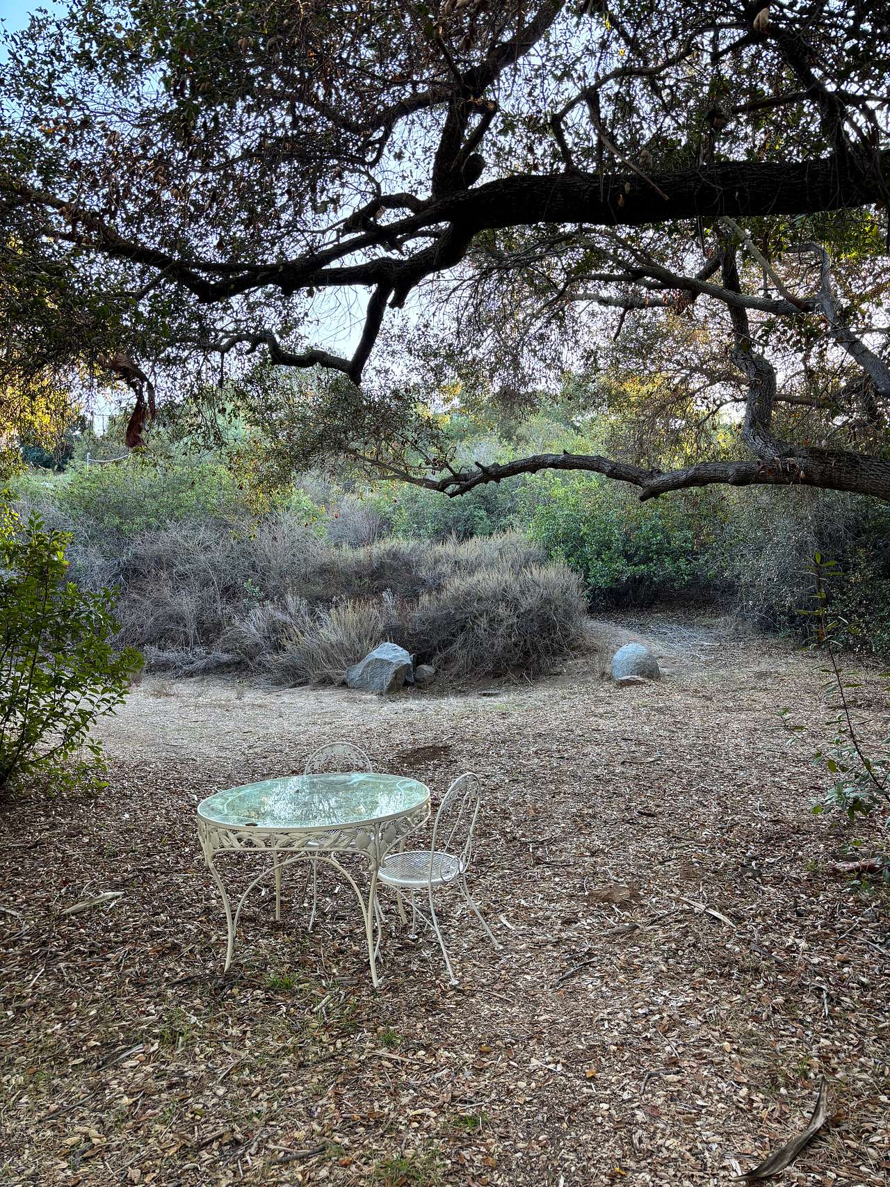 Currently, there is a table with two chairs but two more can be added if needed. 
