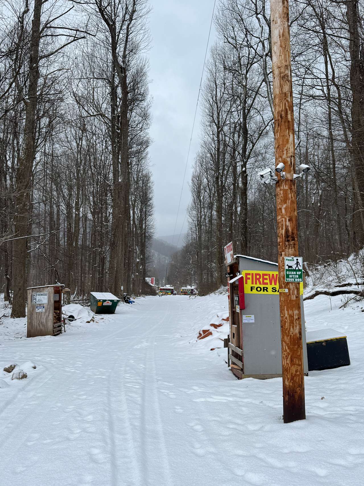 Firewood stations just past the office and coffee house
