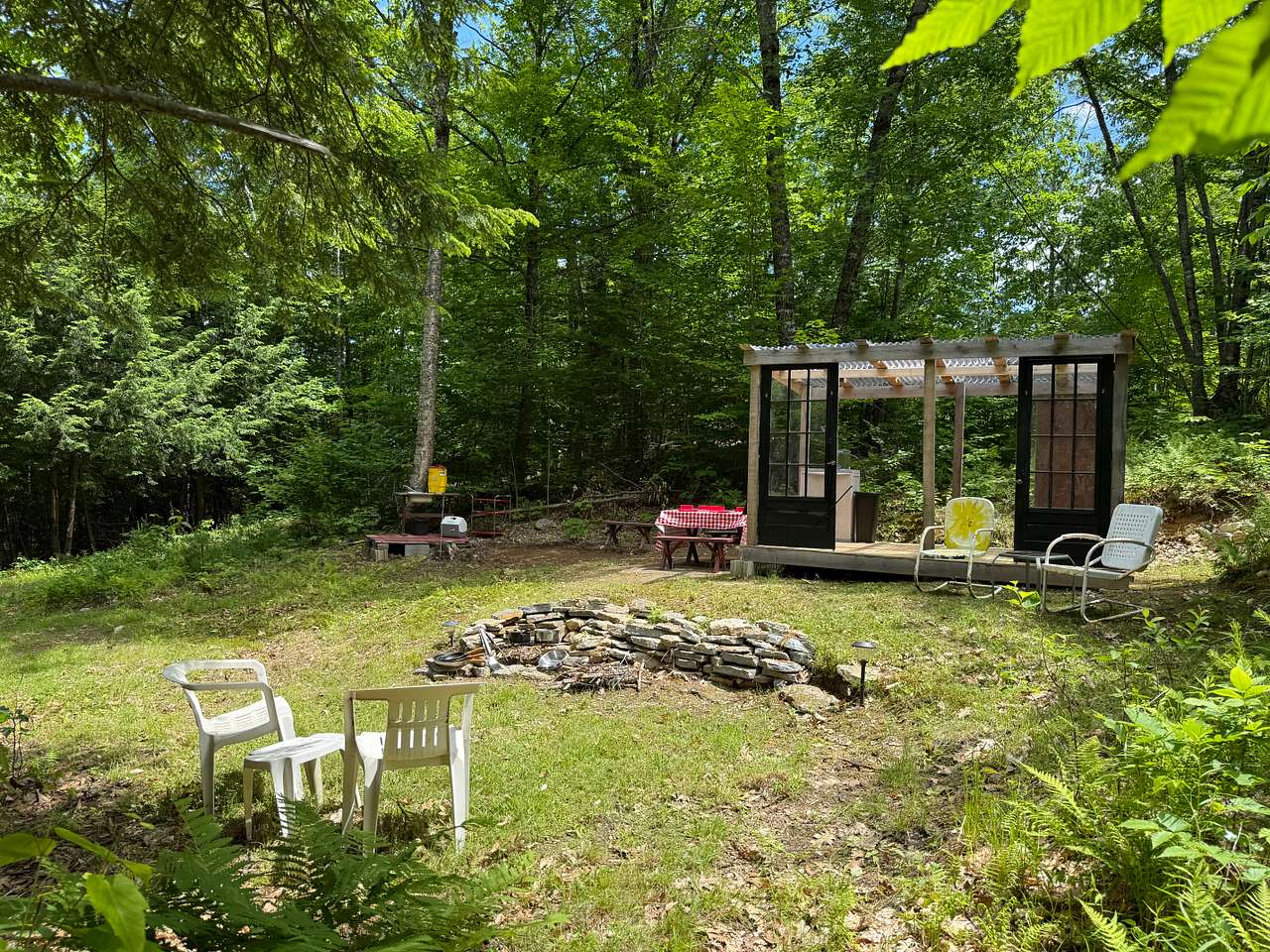 Large grassy site if you prefer your tent not covered. Pad is 8x12. 