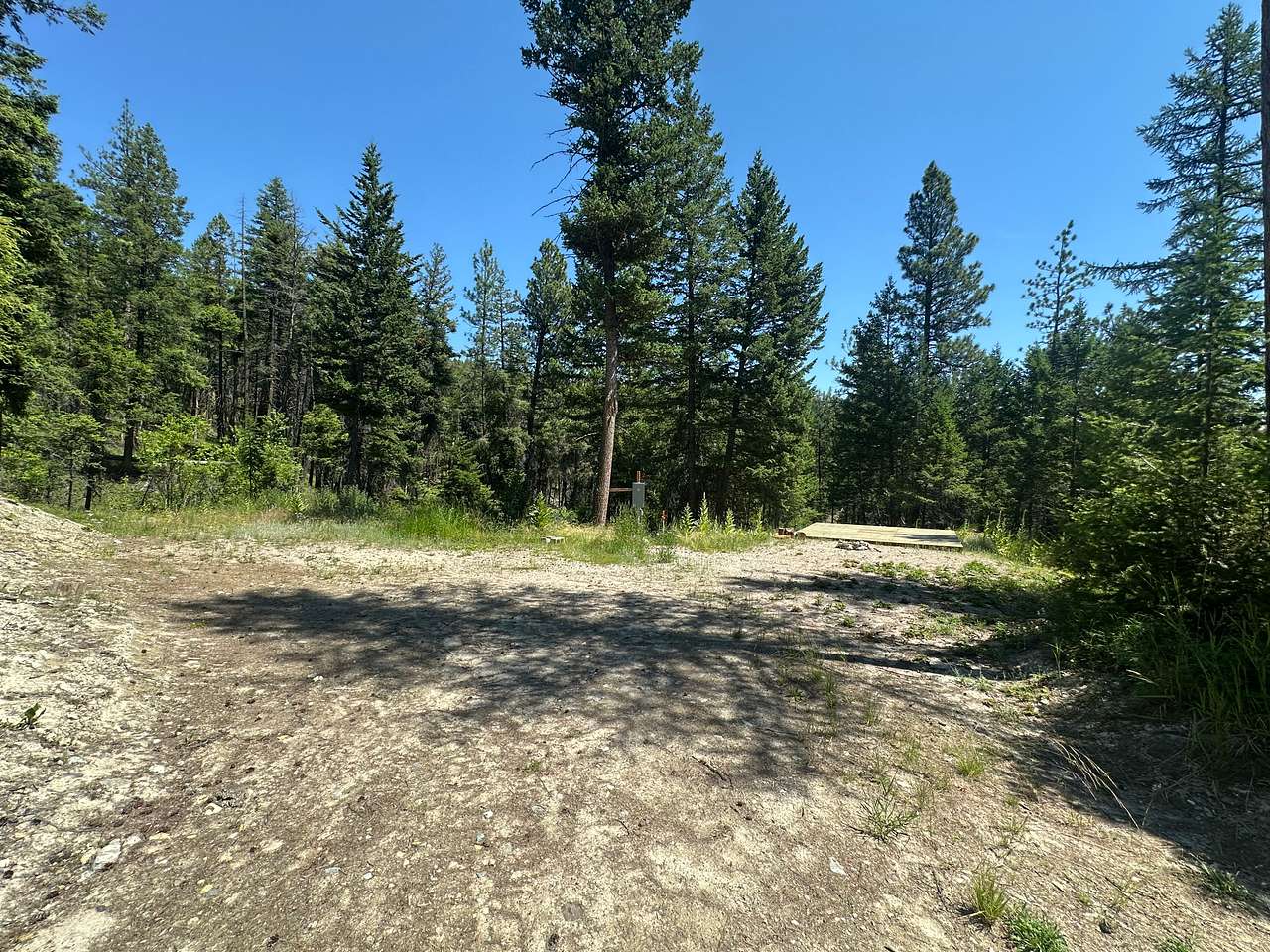 Another view from different angle of the northern, L-shaped, campsite. Wood platform is off to the right. 
