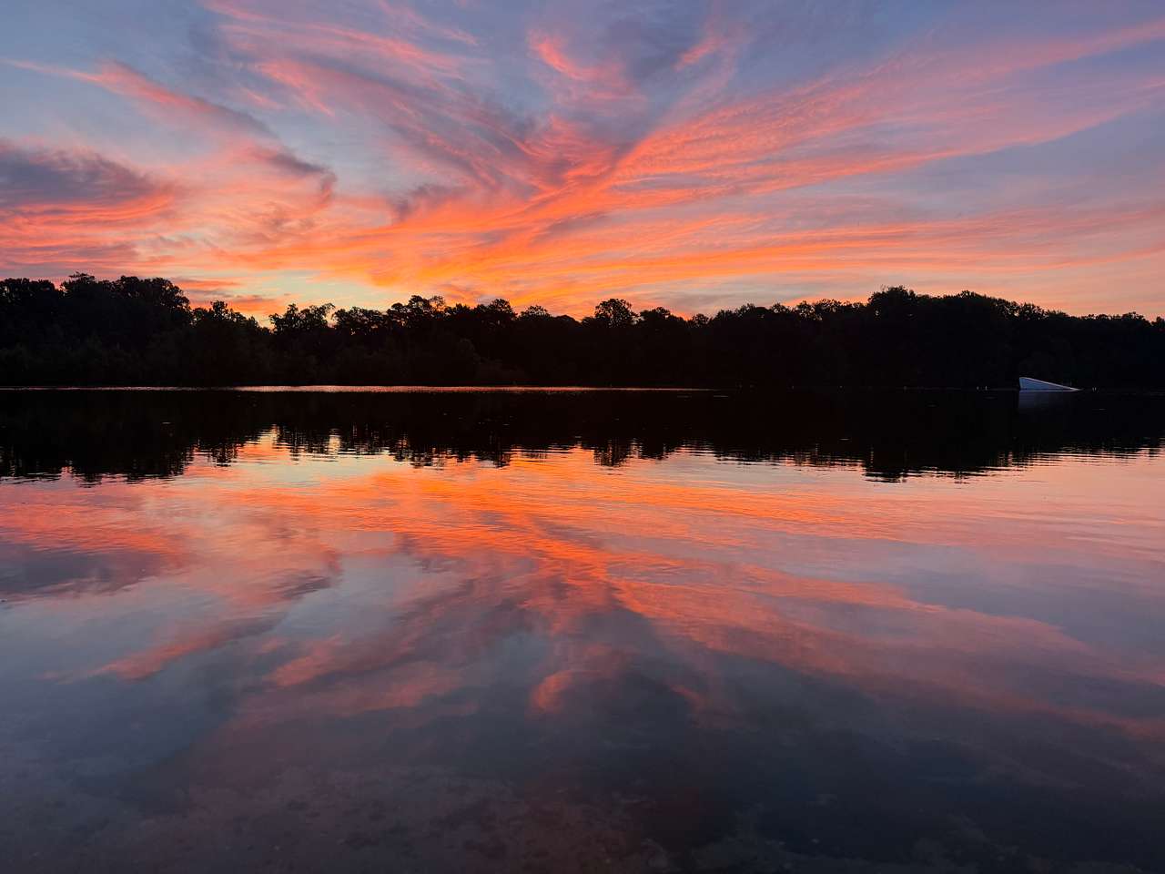 Sunrise over the pond from the camping area. Great stargazing too