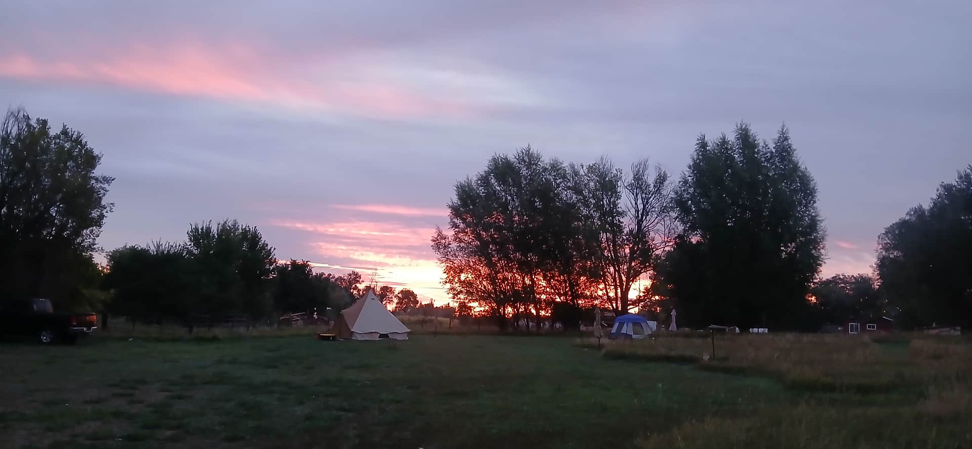 Sunrise looking over the tent area