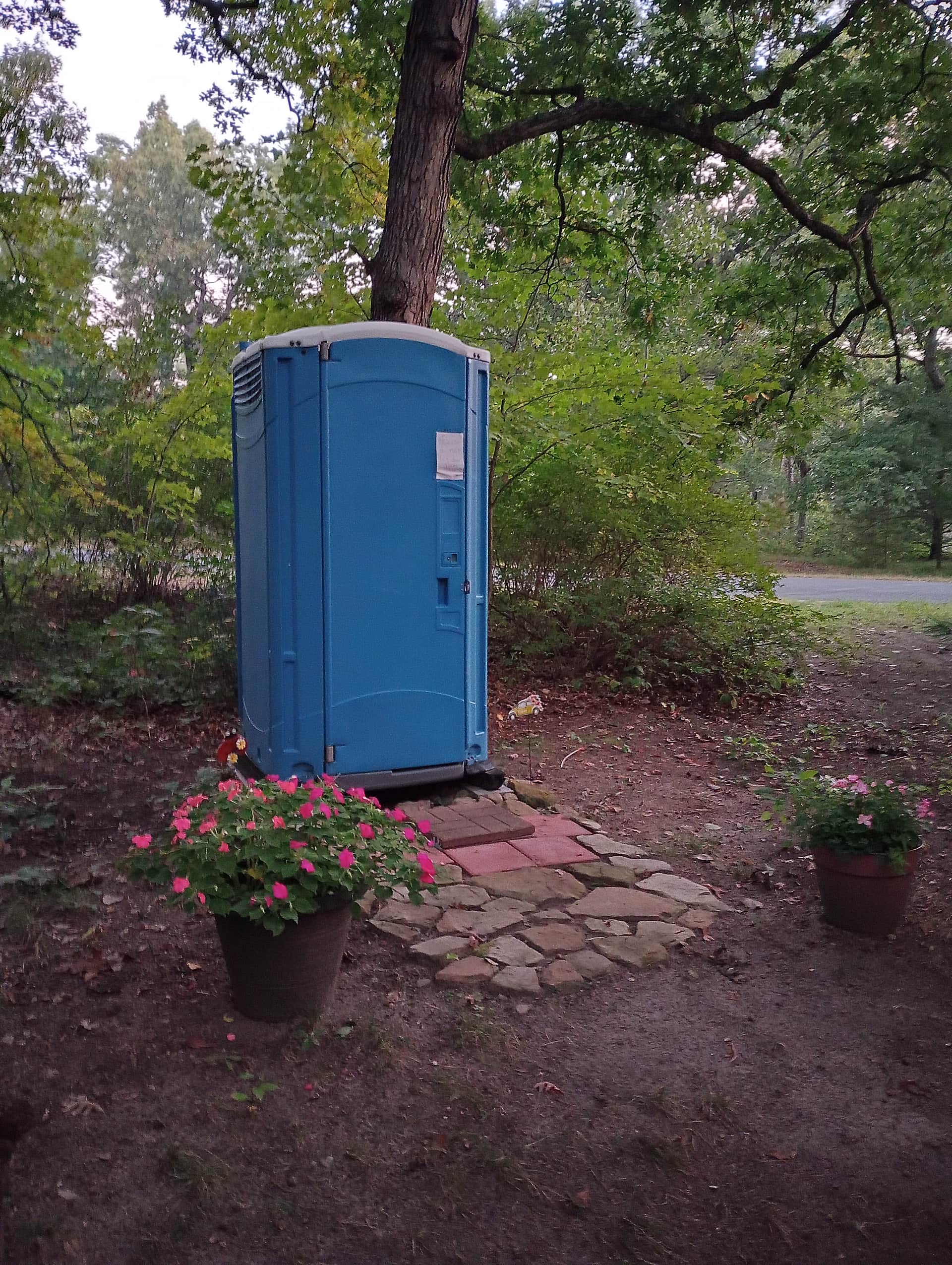 Welcoming entrance to the outhouse. Little touches go. Along way to show Steve cares.