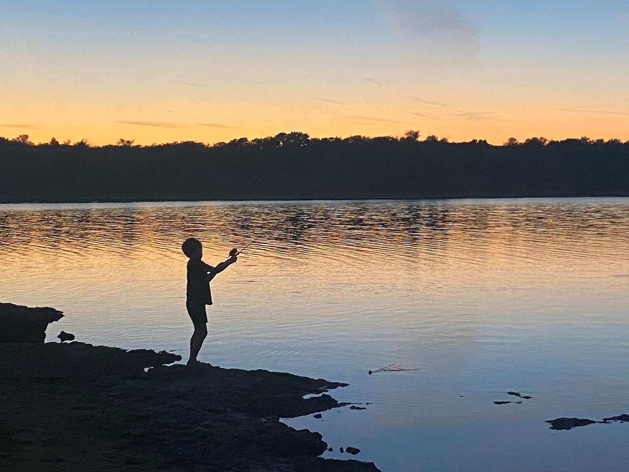 Fishing at sunset