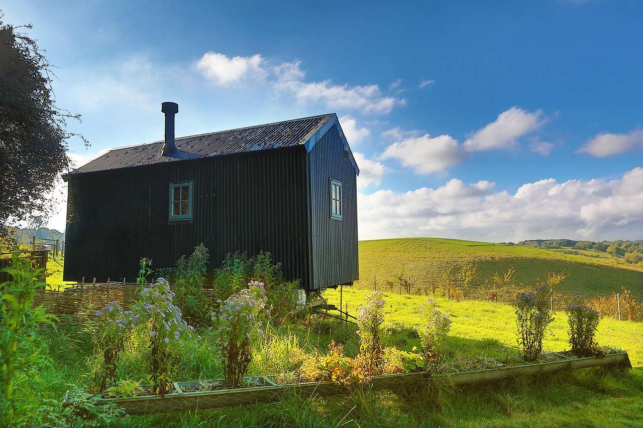 An authentic shepherd's hut in Kent, restored from the 1890s and kitted out for couples with a king-sized bed, wood-burning stove and views over the Kent Downs.