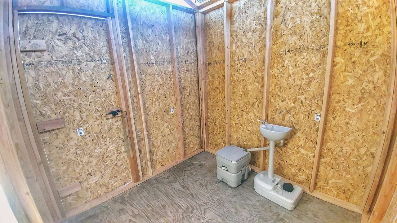 Bathroom Interior w/ Toilet and Sink