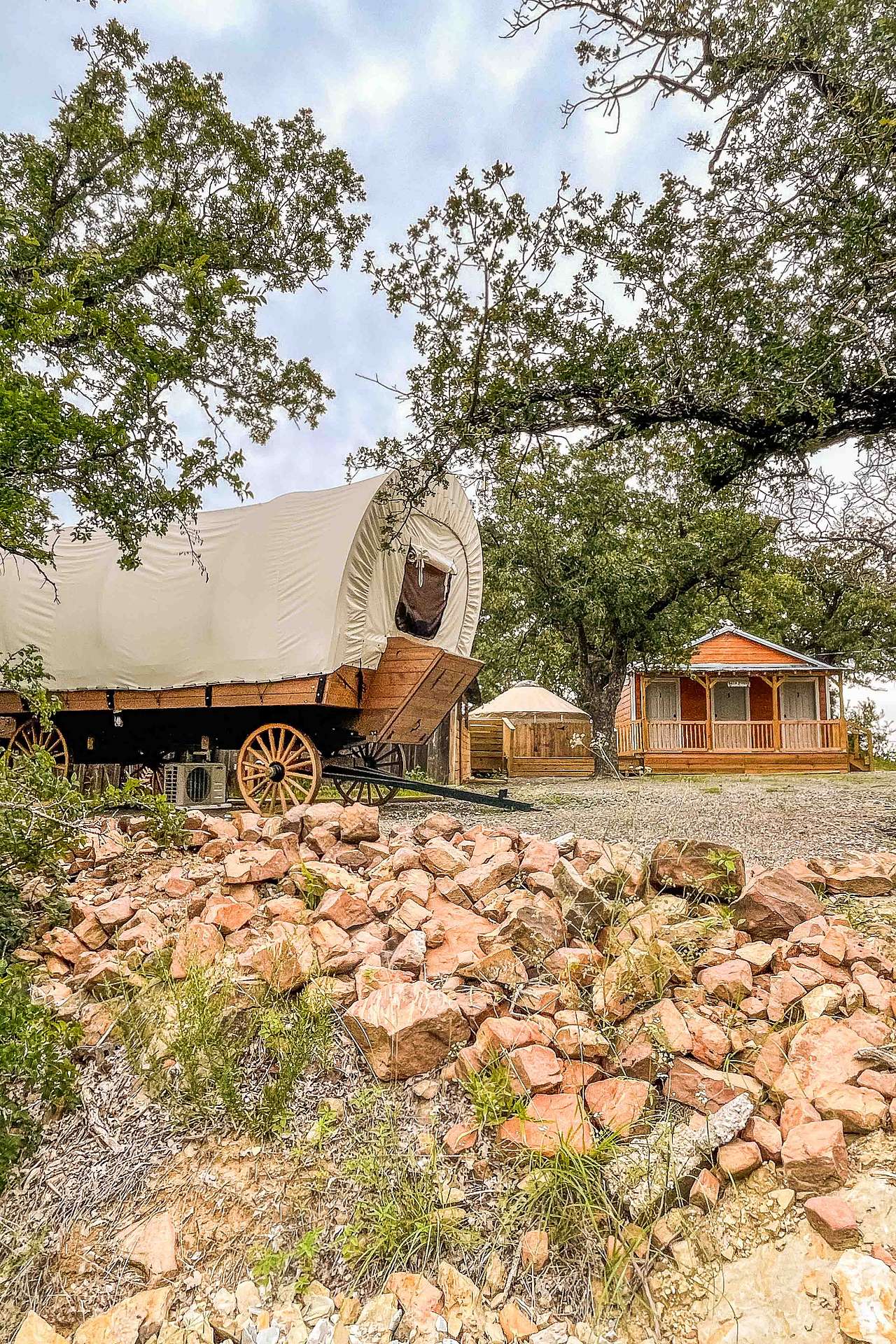 Conestoga wagon side exterior from another campsite 