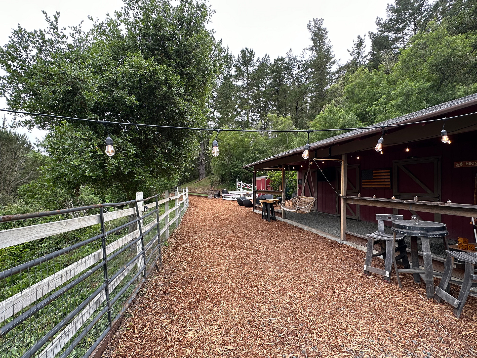 View at the end of the barn looking back towards the bocce court.