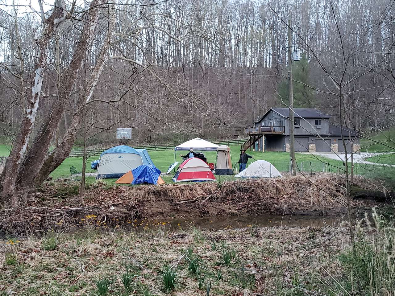 View of campsite with tents from opposite side of Kerr Creek