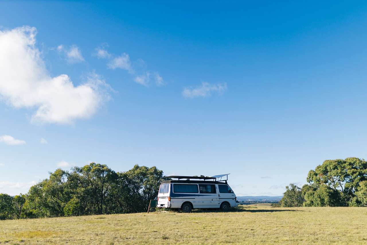 One of the vans is setup on the hill, with beautiful view overlooking the mountains