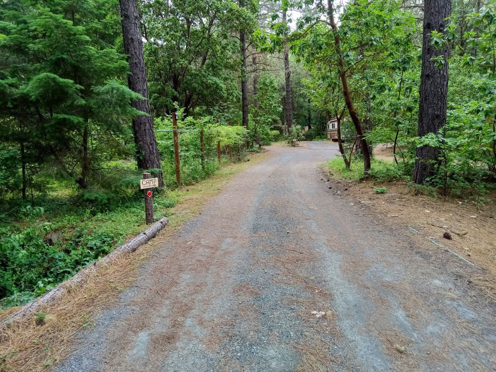 Entry drive on to land... Turn right in front of bus to get to camp.