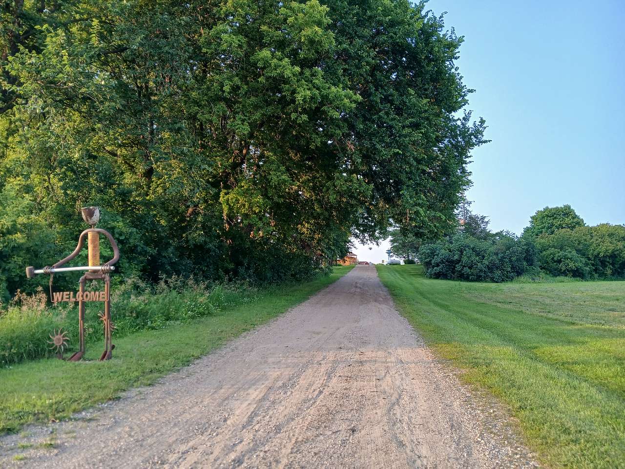 Welcome sign at the end of our driveway. 
Watch the fire number our gps dot is farther north than we are.