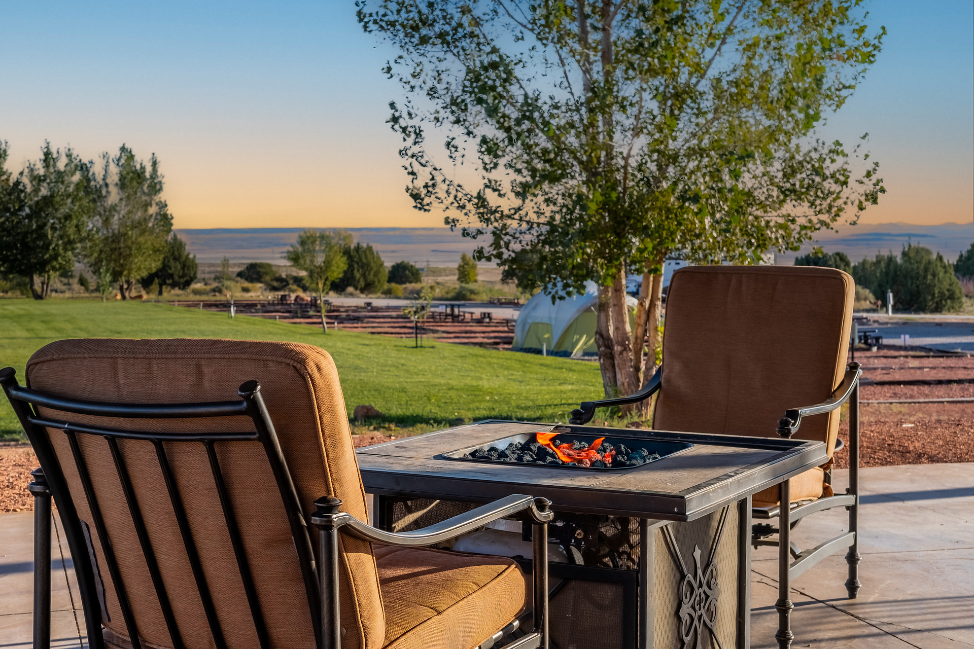 Cozy outdoor seating with firepits under our pavilion