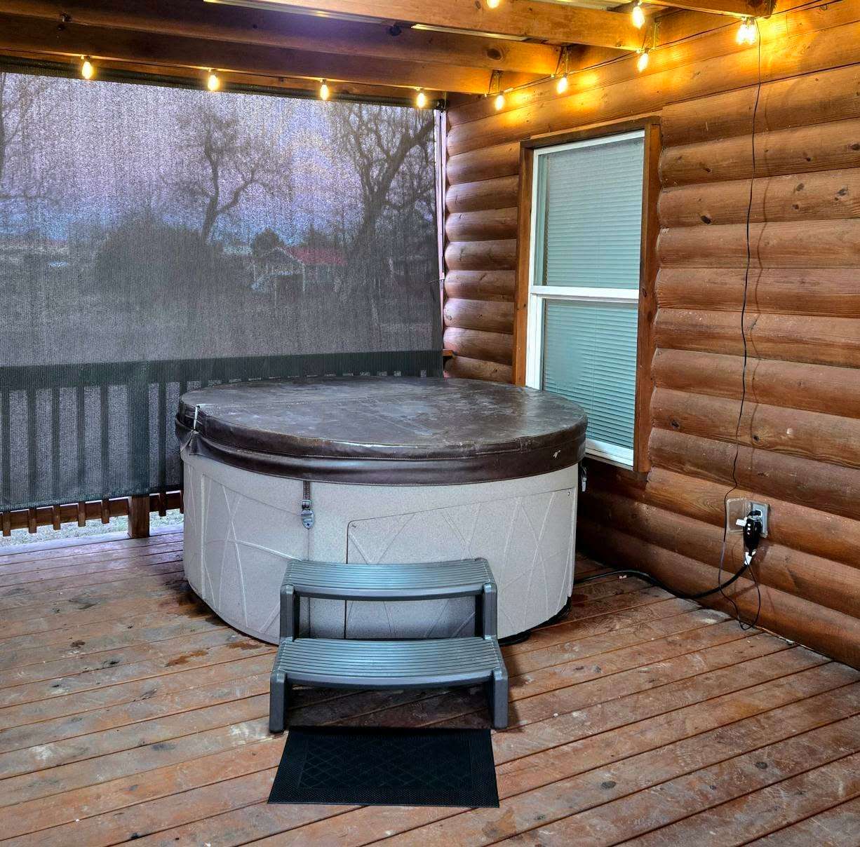 Hot tub with privacy shades