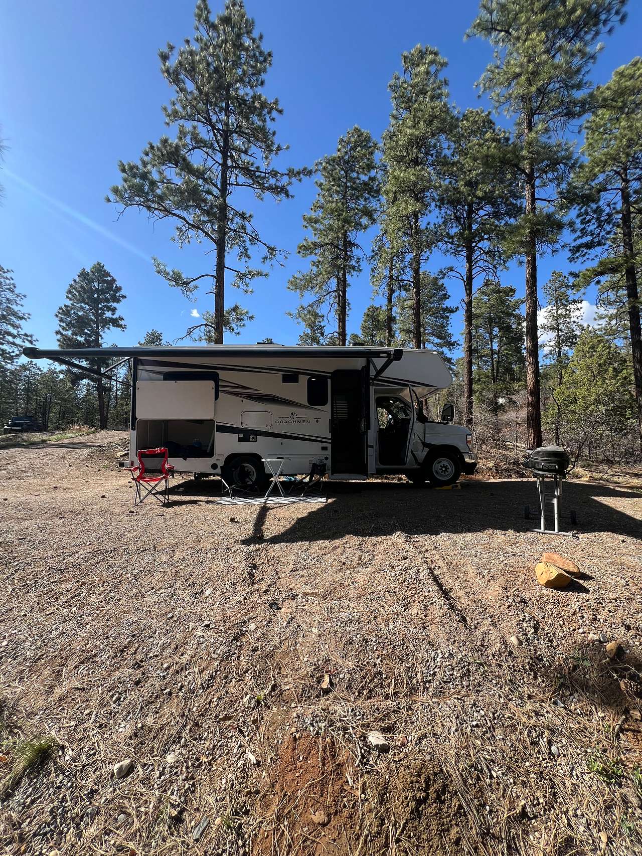25ft class C. Level spot with hookups 
