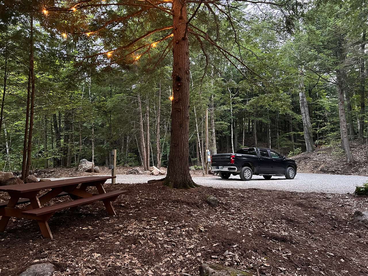 Softly lit picnic area.